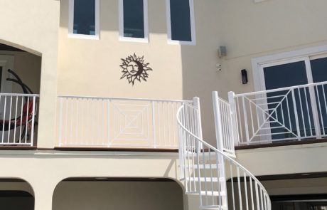 Second story balcony with spiral stairs